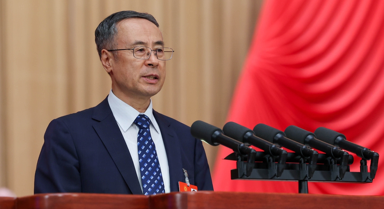 萬立駿在第十一次全國歸僑僑眷代表大會上的報告